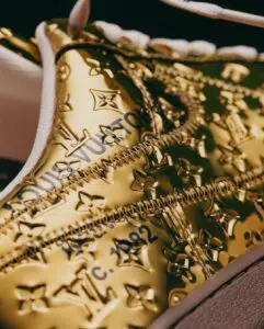 sneakers vuitton dorate anteprima